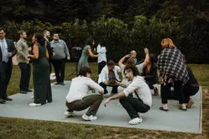 Wedding party dancing at the tented reception