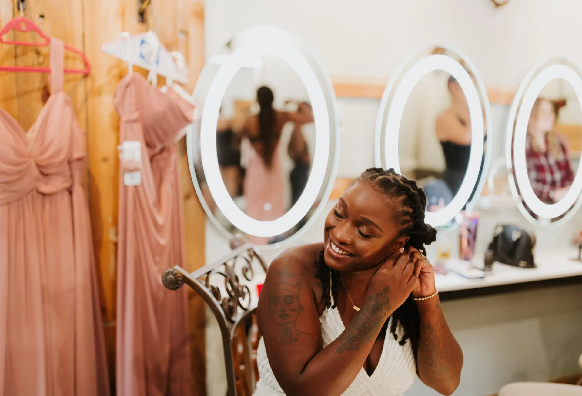Getting-ready moment in the Barn Suite with natural light