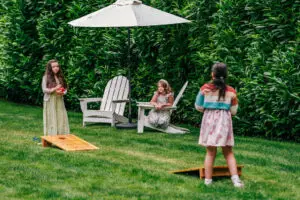 Wedding guests enjoying outdoor games by the river