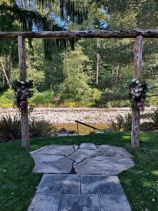 River rapids visible behind the ceremony seating
